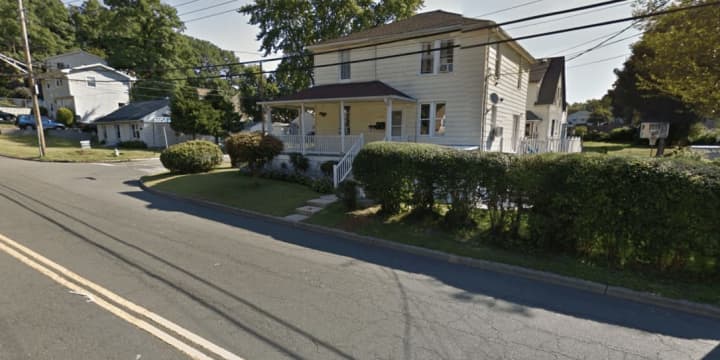 Greenburgh police responded to a strange sight Monday morning when they found a drunk driver asleep at the wheel parked halfway on a White Plains lawn.