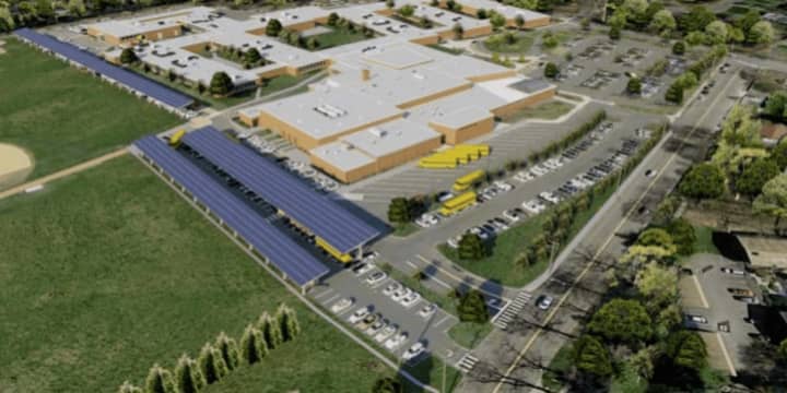 This image shows how solar carports would look at Fairfield Warde High School.