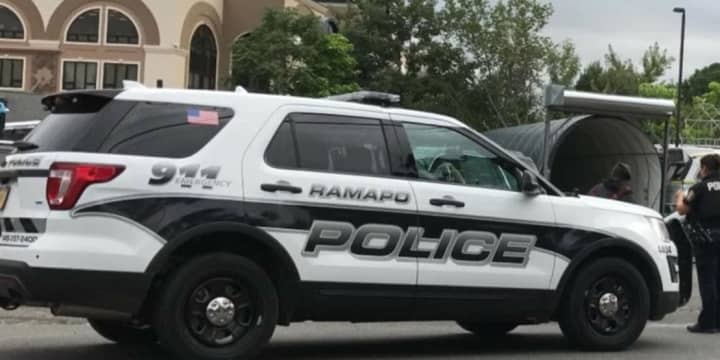 The Ramapo Police Department arrested a man they found slumped over the steering wheel at an area gas station.