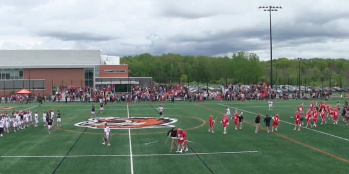 Wesleyan players celebrate their 19-18 upset win over No. 1-ranked RIT in the NCAA Division III semifinals on Sunday.