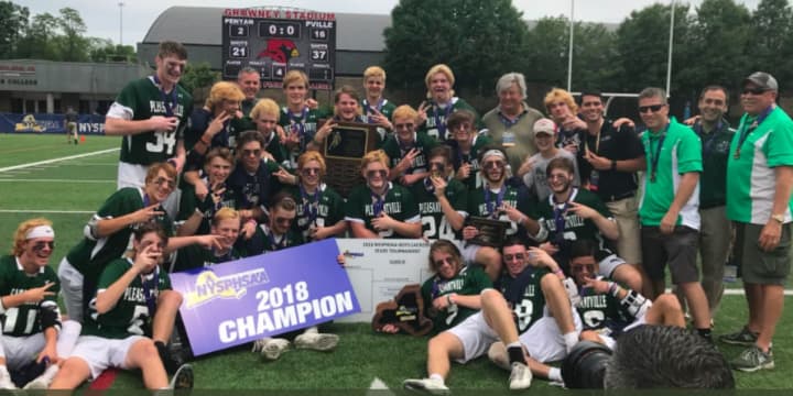 Pleasantville&#x27;s boys lacrosse team celebrates the first state championship in school history, a 16-2 win over Penn Yan on Saturday.