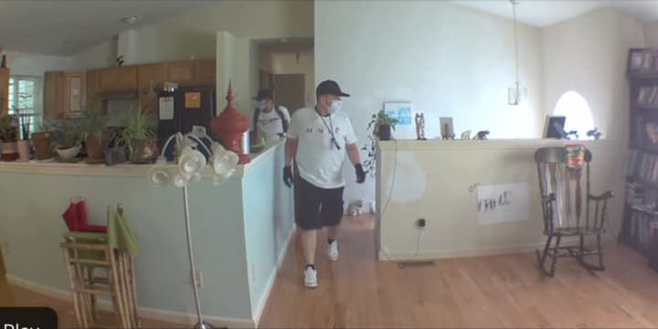 A picture of the suspects inside the home.