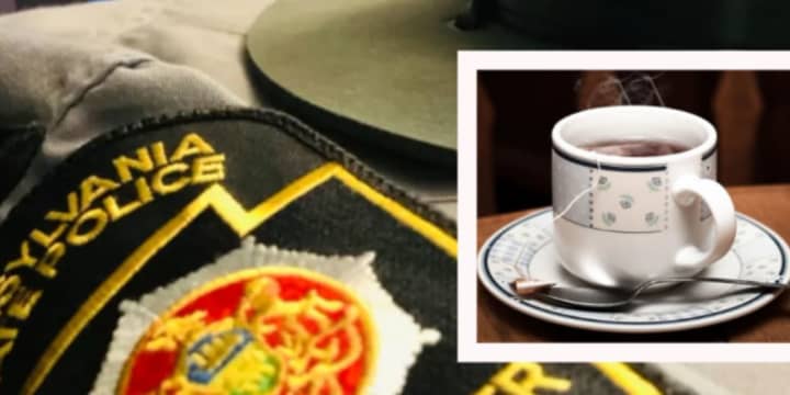 A coffee mug and a Pennsylvania state trooper uniform.