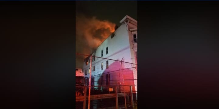 A total of 26 people were displaced when fire burned through a multifamily home in Newark Saturday