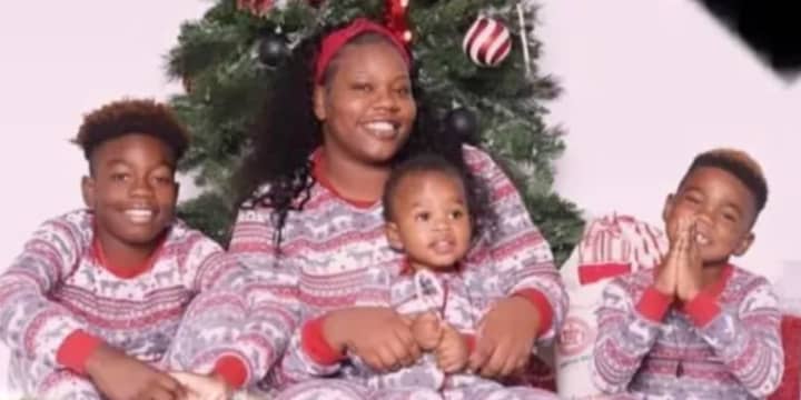 Wanda “Nandi” Fitzgerald, her son Denzel “Buddy” Nolan Jr.-- who were shot dead on New Year&#x27;s Eve pictured with Fitzgerald&#x27;s two surviving children.