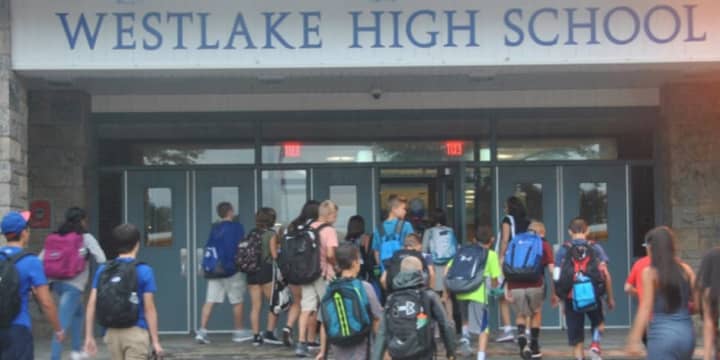 An unidentified ninth-grader at Westlake High School in Thornwood has reportedly been suspended after being accused of posting a cryptic threat and photos of himself with guns. Police found that he was not a threat, but parents are still worried.