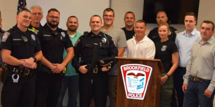 Officers from Brookfield and Ridgefield gathered to welcome and congratulate Officer Terry Hawaux on joining the Brookfield Police Department.