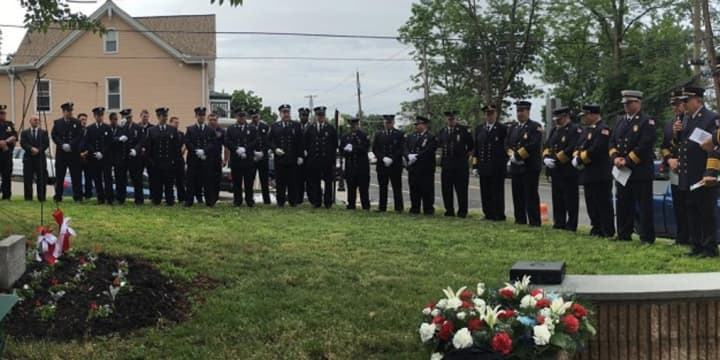 Members of the Croton Fire Department&#x27;s Washington Engine Company No. 2 pay tribute to fallen members of the armed forces and of the fire company during Memorial Day services Monday.