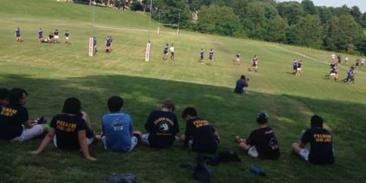 Pelham Youth Rugby players relax in Pennsylvania on the final day of the season.