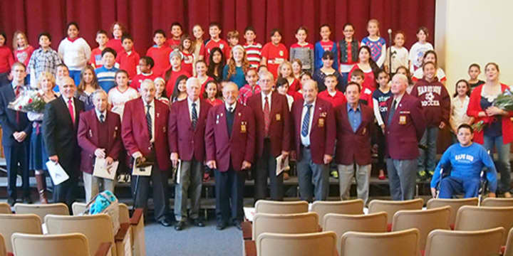 Students at Harrison&#x27;s Samuel J. Preston Elementary School honored local veterans at a recent school assembly. 