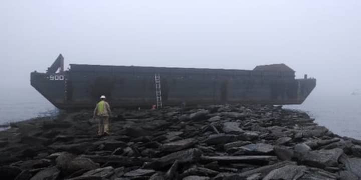 The barge that got hung up on the rocks in Old Greenwich Wednesday was floated off early Friday.