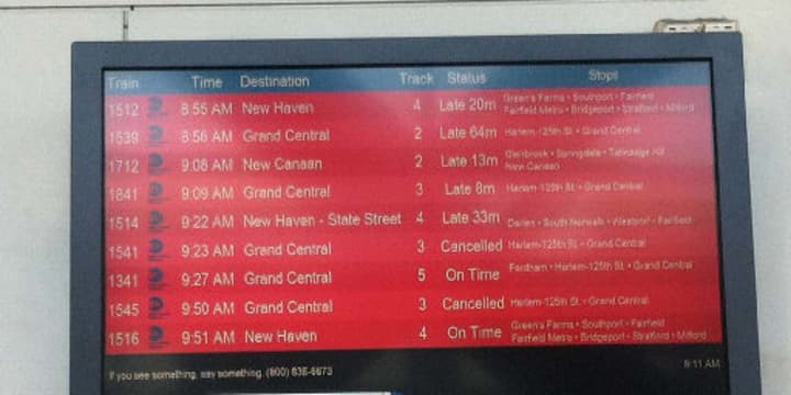 Metro-North Railroad commuters were faced with delays due to a problem with a bridge in Norwalk that couldn&#x27;t be closed until 9 a.m. Thursday. Pictured is the train schedule monitor at the Stamford Train Station.
