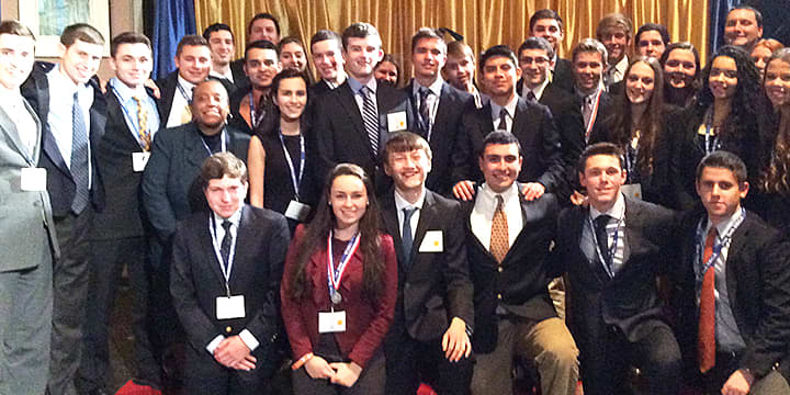 DECA members at Harrison High School recently competed at a state competition in Rochester; three of the students will be attending the nationals in Florida later this month.