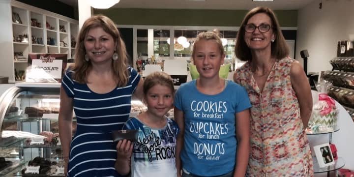 Meredith Scheine, owner of Chocolate Works, Stefanie Frank, Alexandra Frank and Susan Cator, president of the Darien Chamber of Commerce.