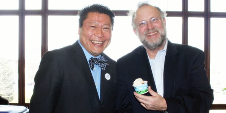 State Rep. Tony Hwang, a Republican from Fairfield, enjoys a sample of Cherry Garcia ice cream with Jerry Greenfield of Ben &amp; Jerry&#x27;s. 