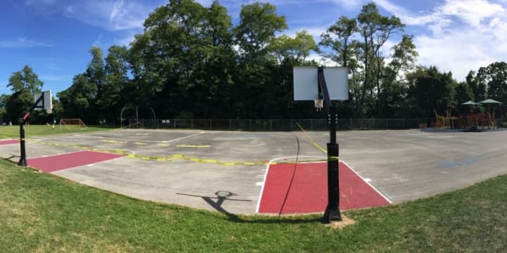 The Ossining Upper Elementary School PTA worked with parent volunteers and principal Kate Mathews to paint games and a basketball court at Claremont School.