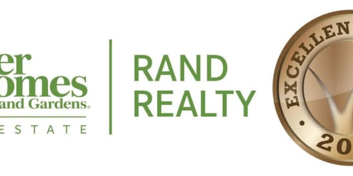Better Homes &amp; Gardens Rand Realty was honored for its community involvement.