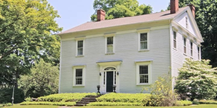 The home at 209 Sasco Hill Road in Fairfield has been well-maintained and has the appearance of an early 19th century home.