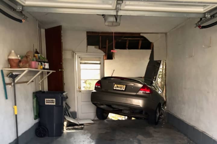 Bergen Driver Plows Older-Model Sedan Through Garage Wall