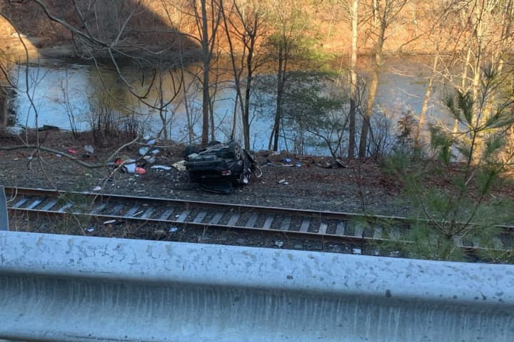 CT Man Killed After Vehicle Flips Over Railroad Tracks, Police Say