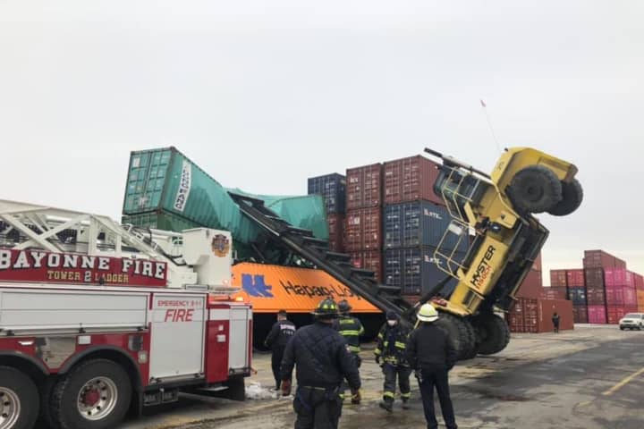 Firefighters Extricate Crane Operator When Machine Topples In Bayonne