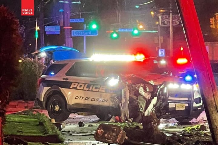 Clifton Police Car Goes Airborne During Chase, Knocks Down Signs, Pole In Garfield