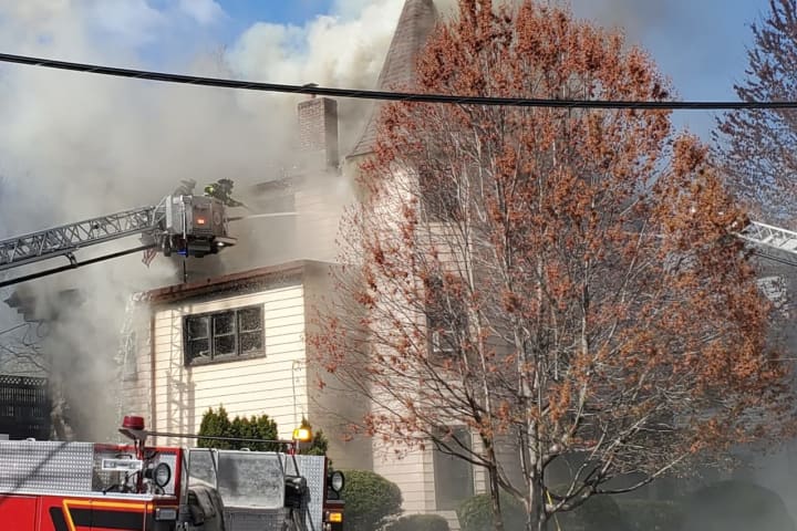 Flames Blow Through Roof Of Passaic Home