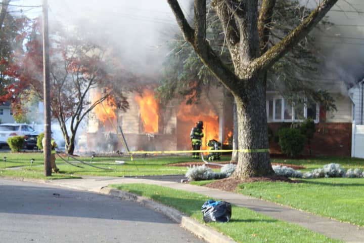 PHOTOS: Fire Ravages Wayne Home