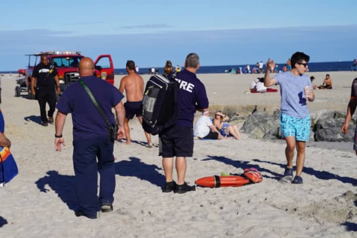 Off-Duty, Rookie Lifeguard Riding Bike Home On NY Boardwalk Saves Swimmer In Distress