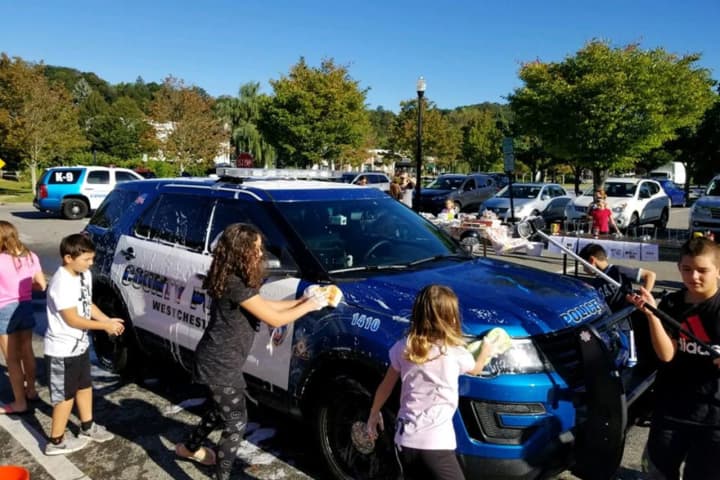 Mount Kisco Elementary School Students Polish Up County Police Cars