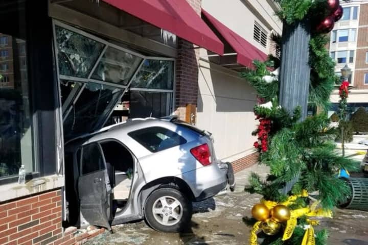 PHOTOS: SUV Plows Through Front Of Edgewater Store