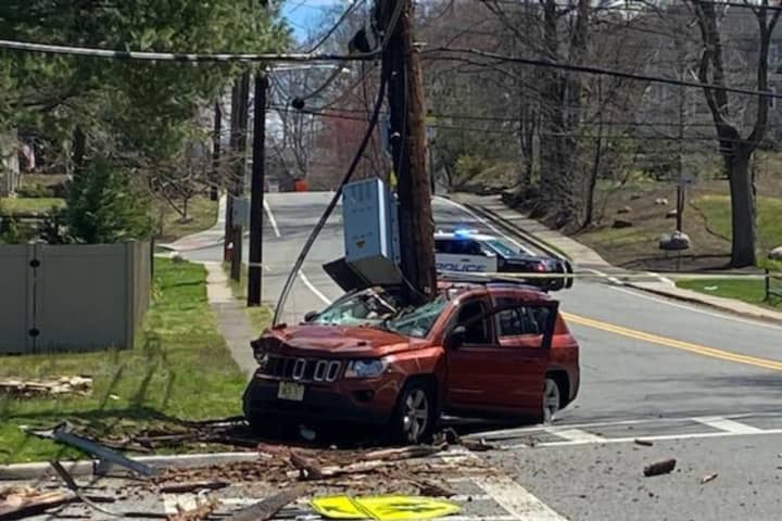 Jeep Splits Pole, Driver Walks Away Without Scratch In Washington Township