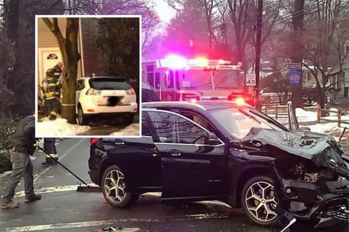 SUVs Collide In Demarest, One Hits House