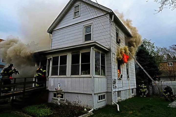 Hackensack FD: Off-Duty Firefighter Helps Elderly Woman Cross Street As House Burns