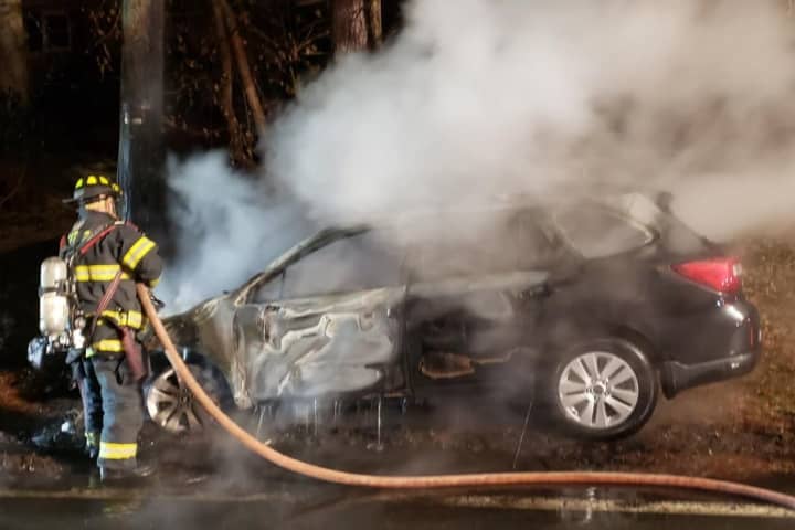 Driver Escapes After Car Crashes Into Pole, Bursts Into Flames In Rockland
