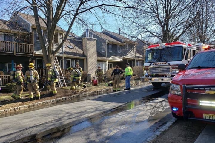 HEROES: Police Officer, Fire Chief Rescue Homeowner From Clinton Apartment Fire