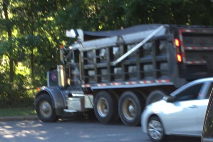 Dump Truck Hits Hawthorne Guardrail