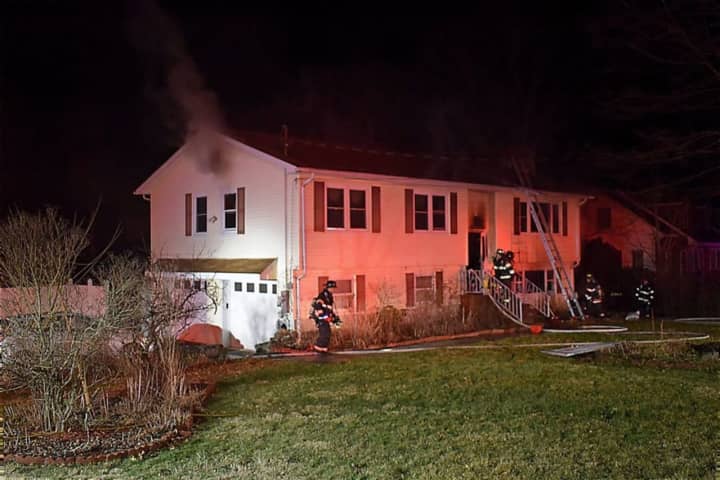 Photos: Resident Escapes After House Fire Breaks Out In Danbury