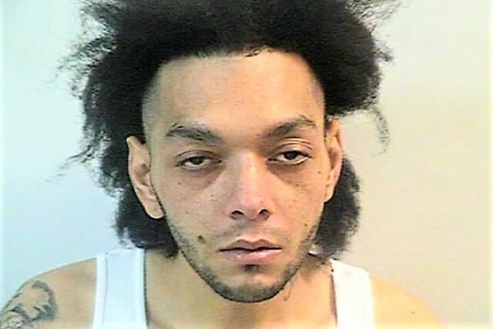 Clifton PD: Christmas Burglar Caught Carrying Two Loaded Guns
