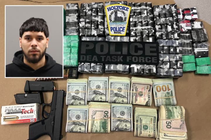 Guns, Stacks Of Cash, Heroin: Police Bust Suspected Trafficker Following Holyoke Raid