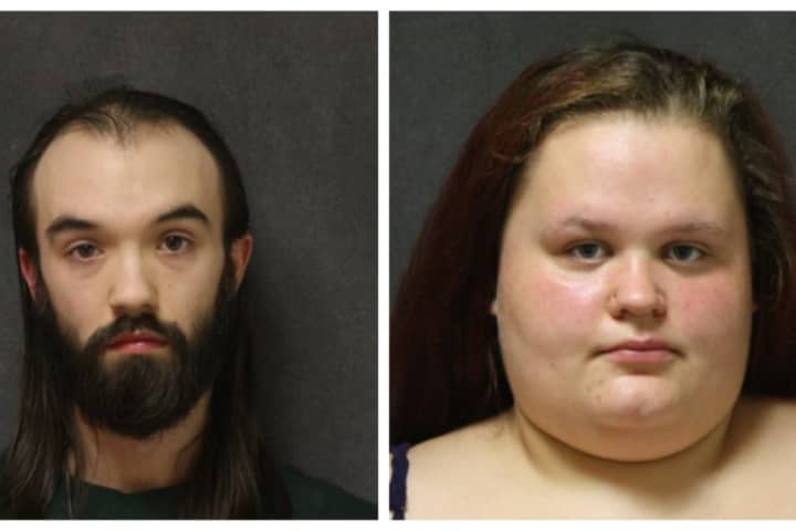 Two Arrested After 2-Year-Old Alone On Roof Of CT Home Rescued