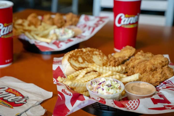 Huge Crowds Turn Out To Opening Of First Raising Cane's Fast-Food Restaurant In Enfield