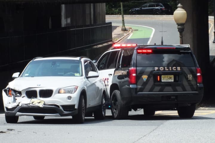 SUV In Crash Rolls Into Ridgewood Police Car