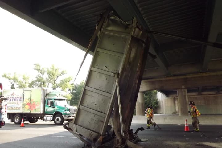 Vertical Hold: Dump Truck Trailer Gets Wedged Under Route 17 Overpass In Mahwah