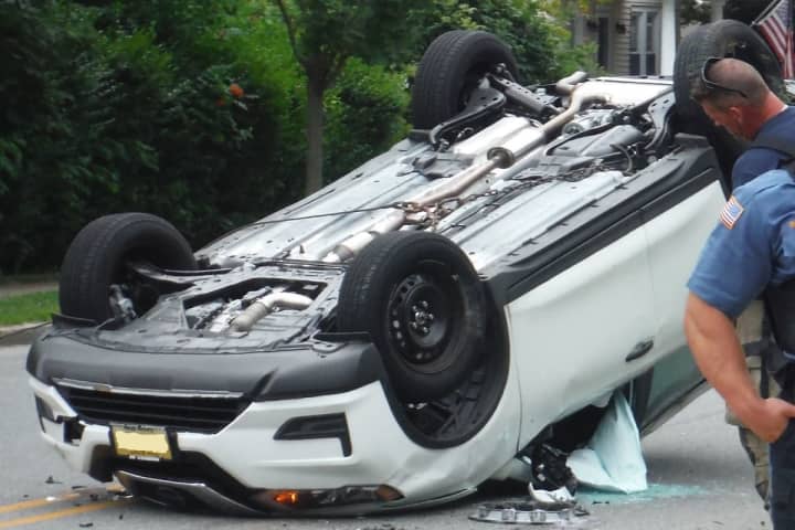 PHOTOS: SUV Overturns In Hawthorne Crash