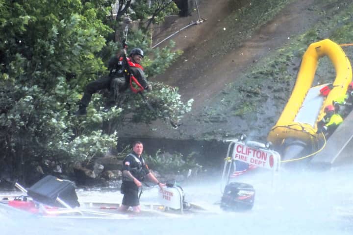 Firefighters On Rescue Mission Airlifted After Going Over Falls In Passaic River