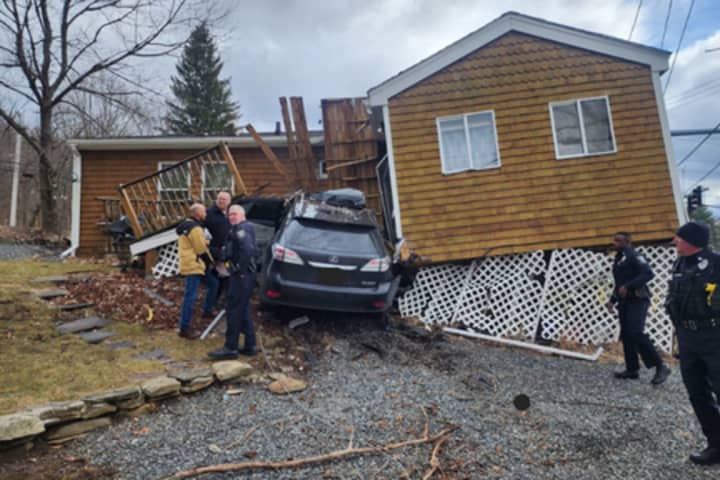 One Hospitalized, House Unlivable After Car Crashes Into Central Mass Home: Police