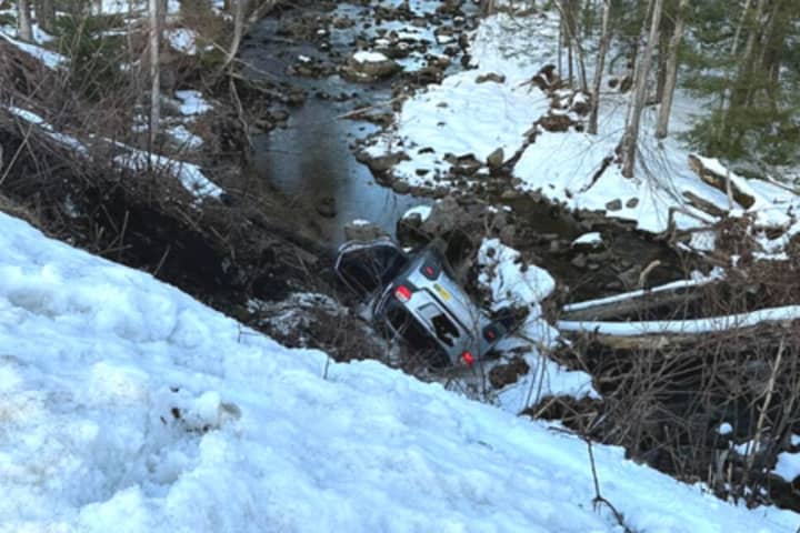 Driver Unharmed After Car Tumbles Into Westhampton Brook: Fire Officials