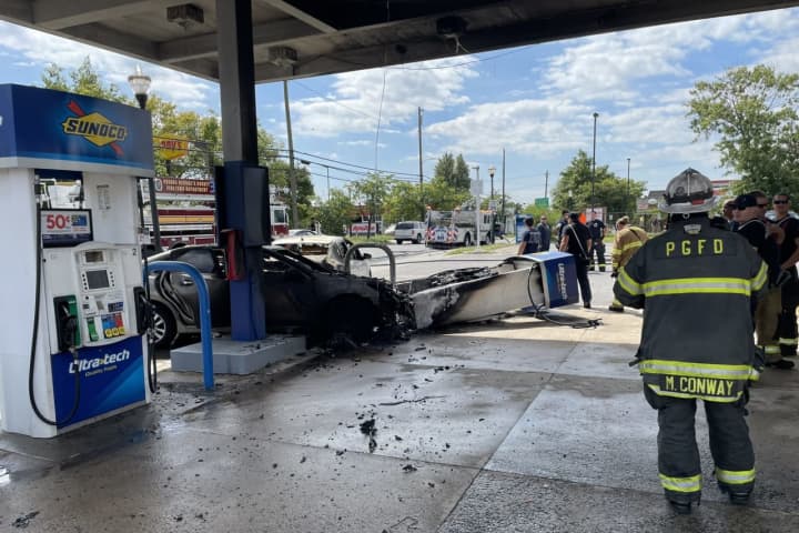 Fiery Crash Reported At Gas Station After Car Plows Through Pump In Laurel (DEVELOPING)