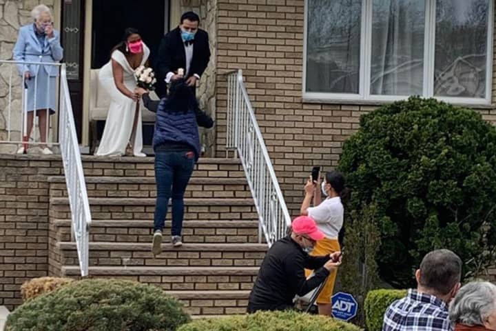 Passaic Florist Stops To Gift Bouquet To Bride, Groom Getting Married On Front Steps